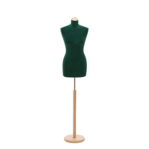 Female tailor bust in green velvet with round ash tree base