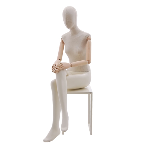 Female mannequin with wooden arms - seated